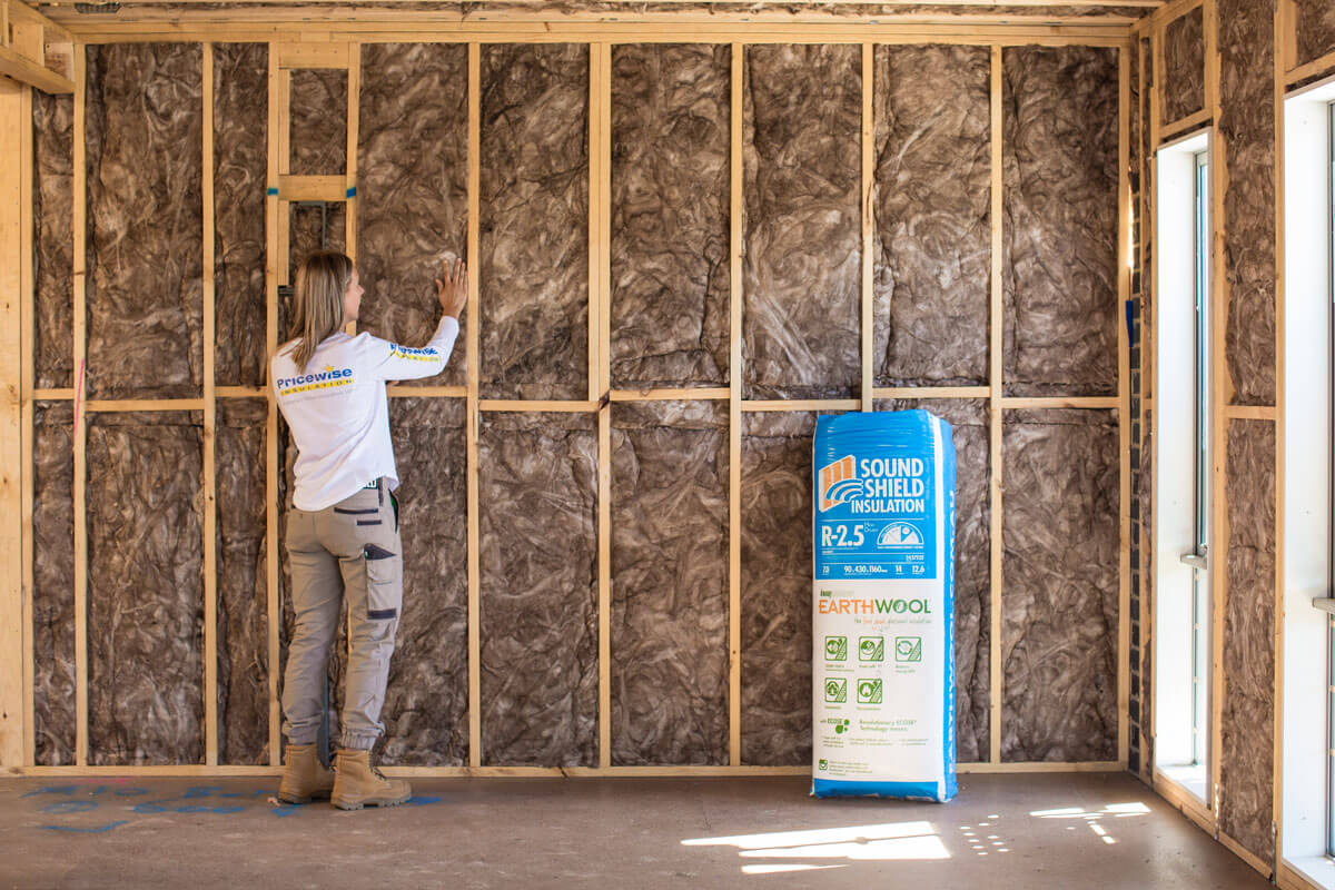 Installing wall insulation in new homes