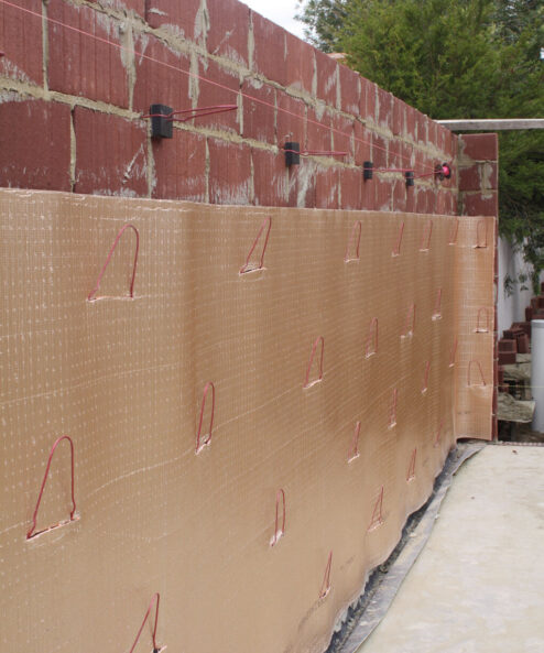 Kingspan Permicav Wall Insulation Rolls installed on a brick wall